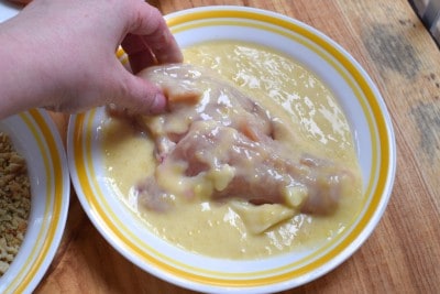 Dip both sides of chicken breasts into soup mixture.