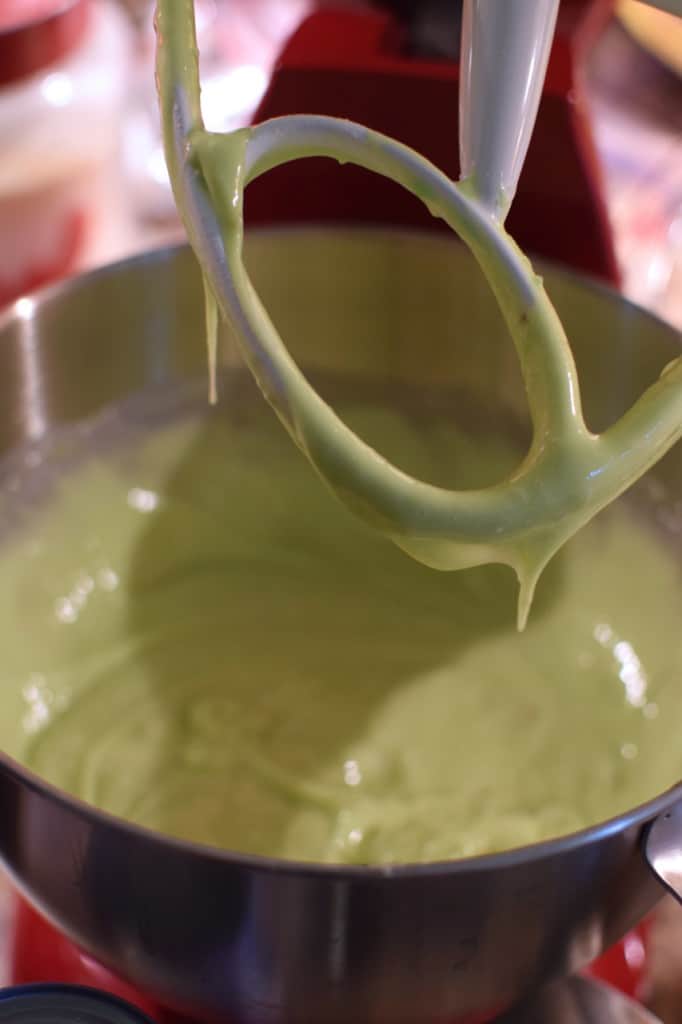 Mix together the cake mix, pudding, oil and eggs with an electric mixer.
