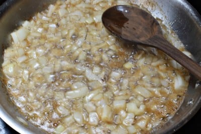 Cook onions in skillet until translucent.