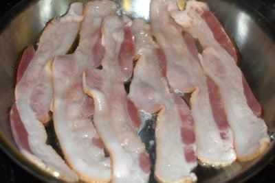 Fry bacon in skillet.