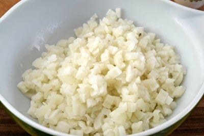 Place drained potatoes in a large bowl.