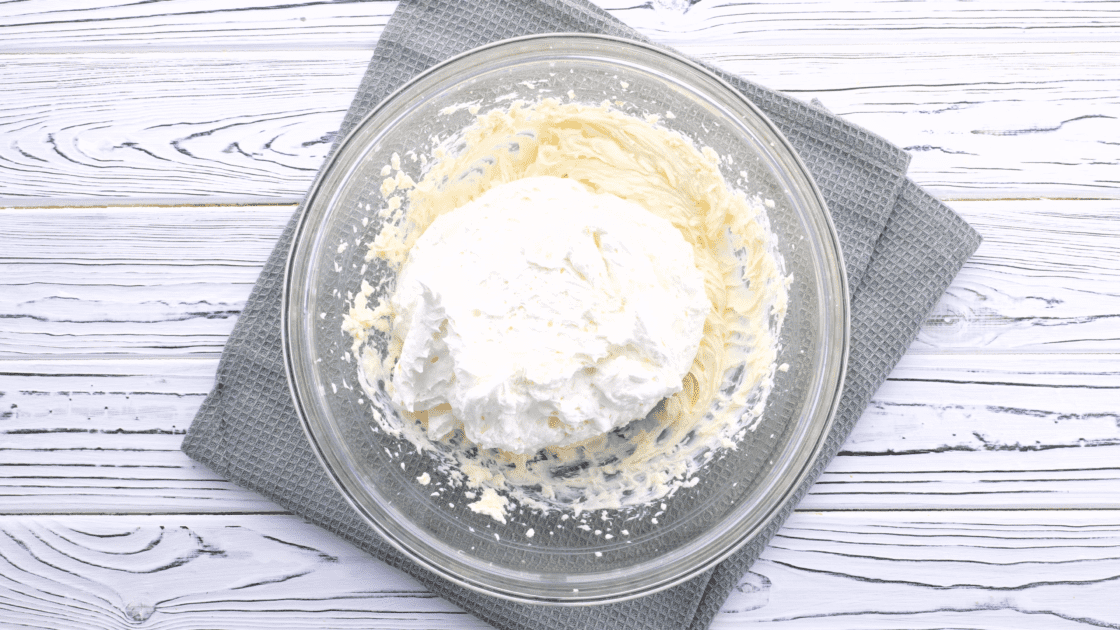 Add Cool Whip to mixing bowl and beat again.