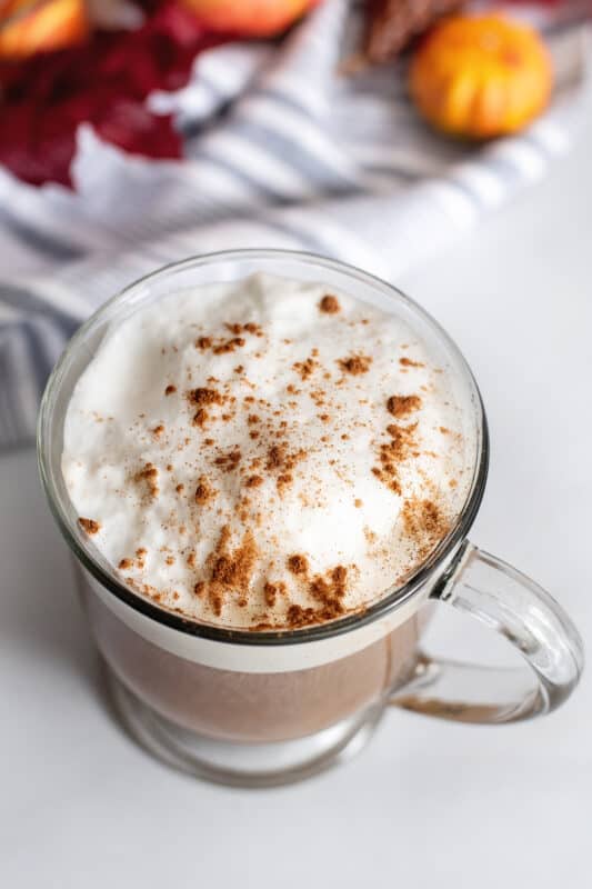Cinnamon sprinkled on top of sugar-free pumpkin spice latte.