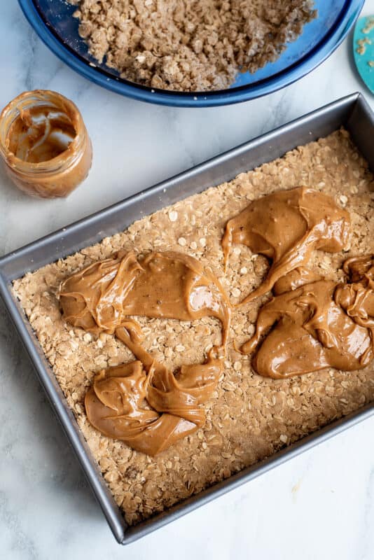 Pour caramel over the oatmeal mix.