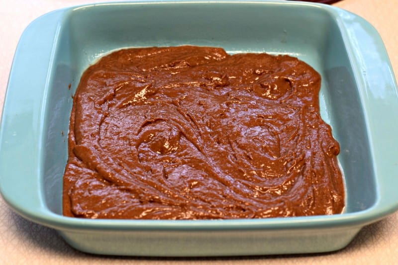 Spread batter into the bottom of a baking dish.