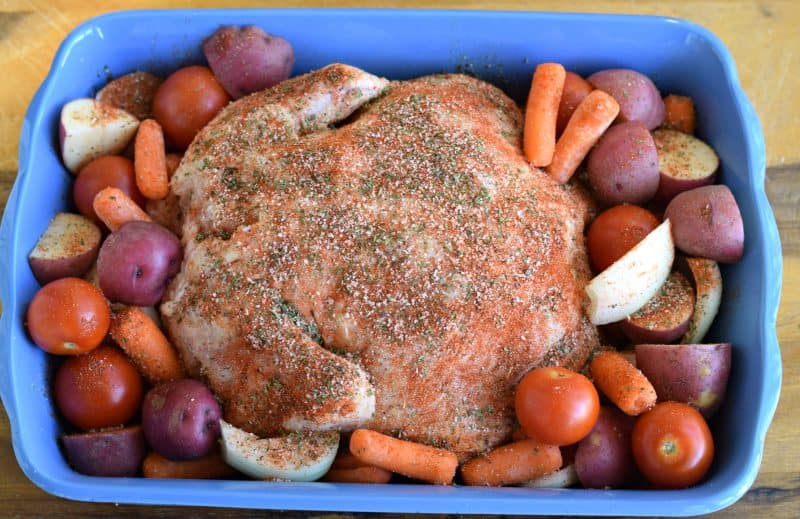Place veggies in baking dish surrounding chicken.