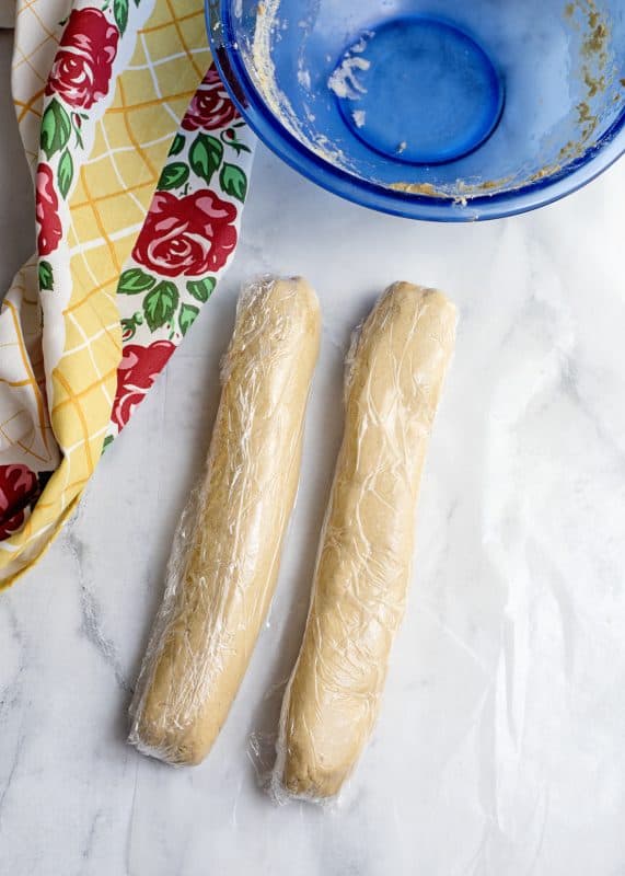 Roll peanut butter candy dough into two logs.