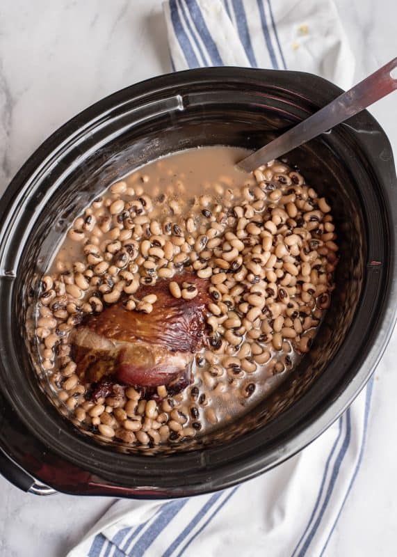 Cook black eyed peas and turkey on low for up to 10 hours.