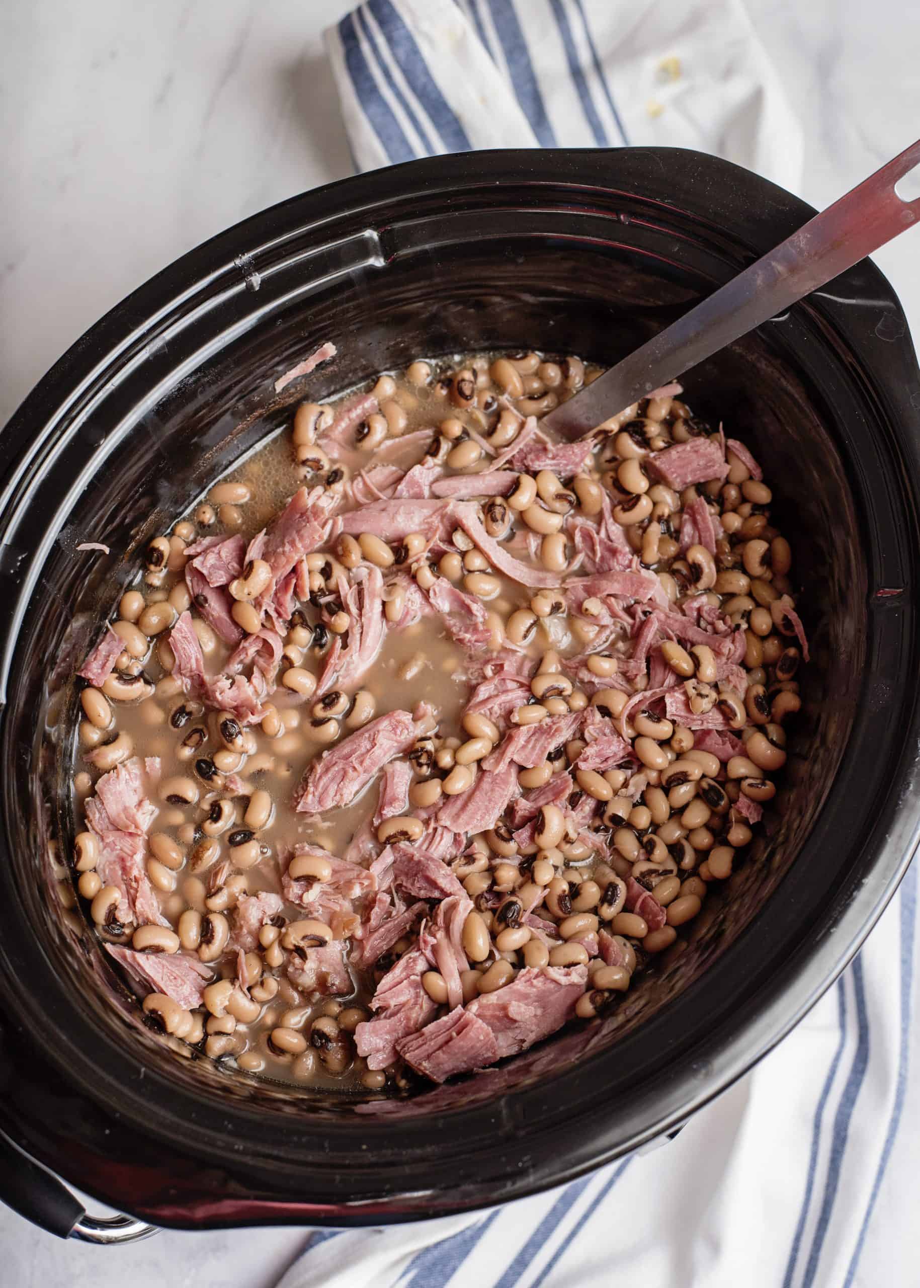 Shred turkey and place it back in the slow cooker.