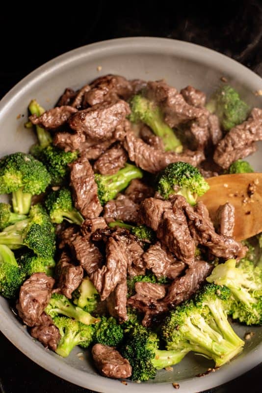 Add beef back to broccoli in pan.