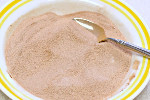 Stir together cinnamon and sugar in small bowl.