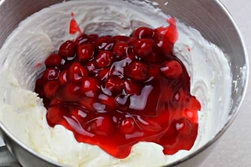 Stir in cherry pie filling by hand.