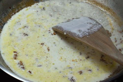Add cream to skillet off the heat and stir constantly.