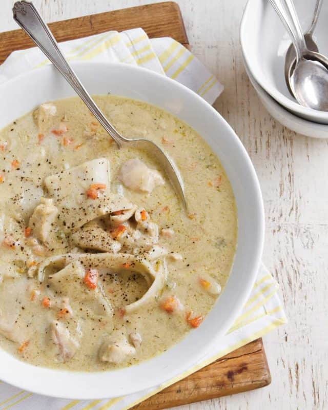 A bowl of slow cooker chicken and dumplings, made in the crock pot.