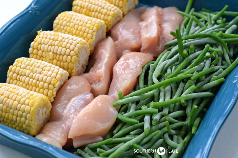 add a row of corn, chicken, and green beans to dish.