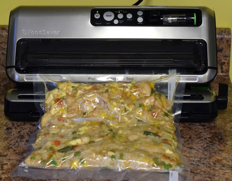 Freezing fried rice in freezer-safe bags.