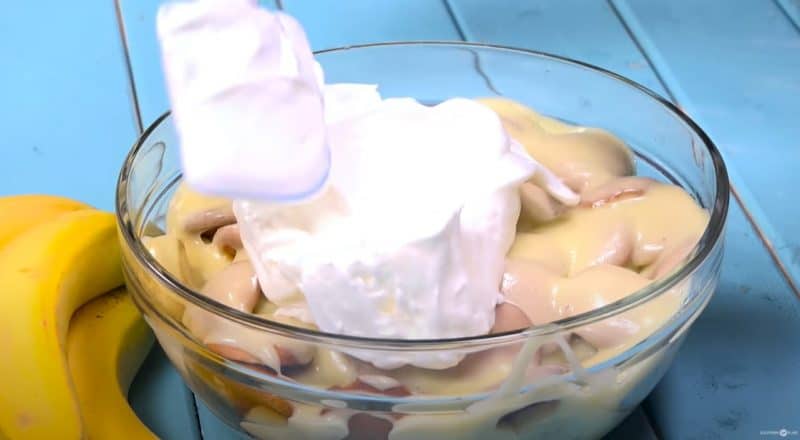 Add meringue on top of homemade banana pudding.