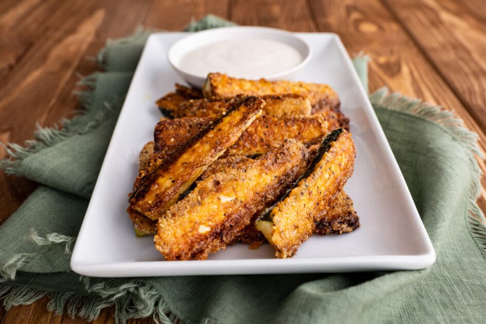 Serve baked zucchini fries with favorite dipping sauce.