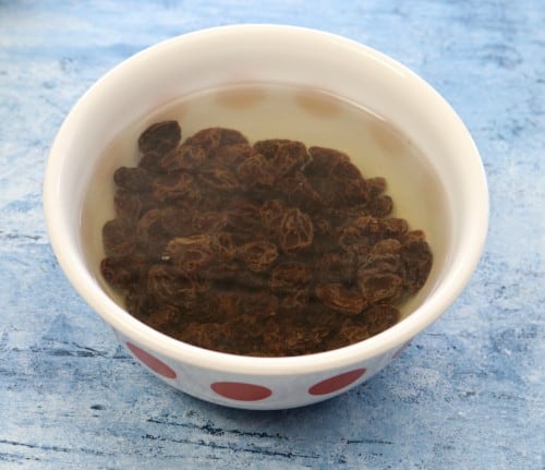 Soak raisins.