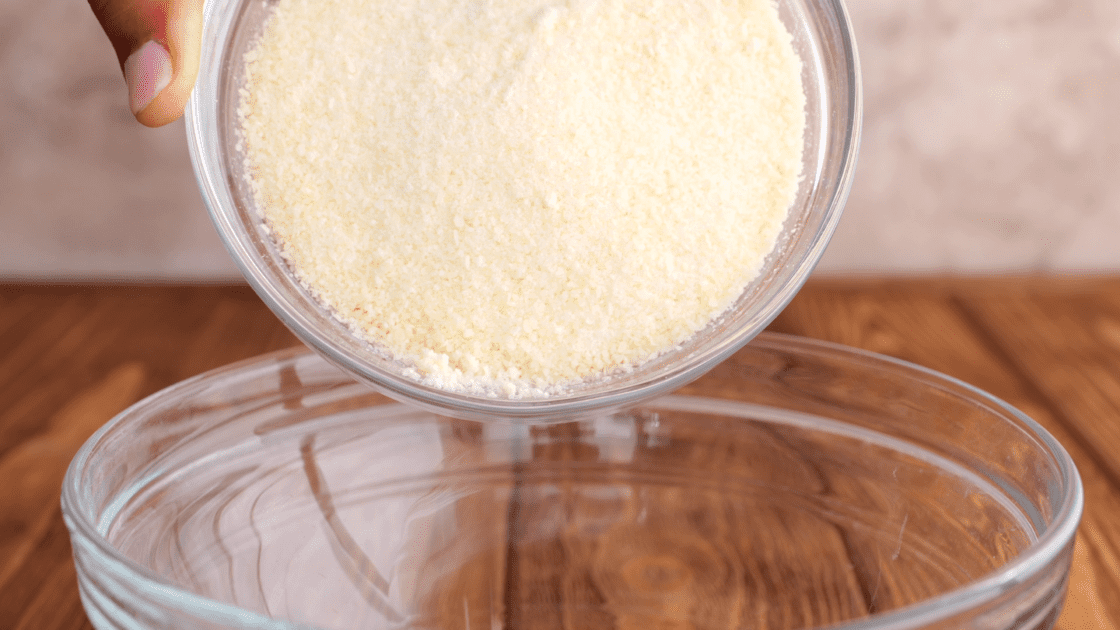Add parmesan cheese to mixing bowl.