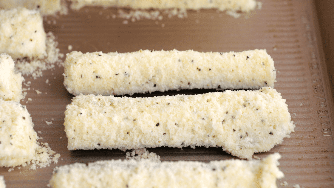 Place zucchini fries on baking sheet.