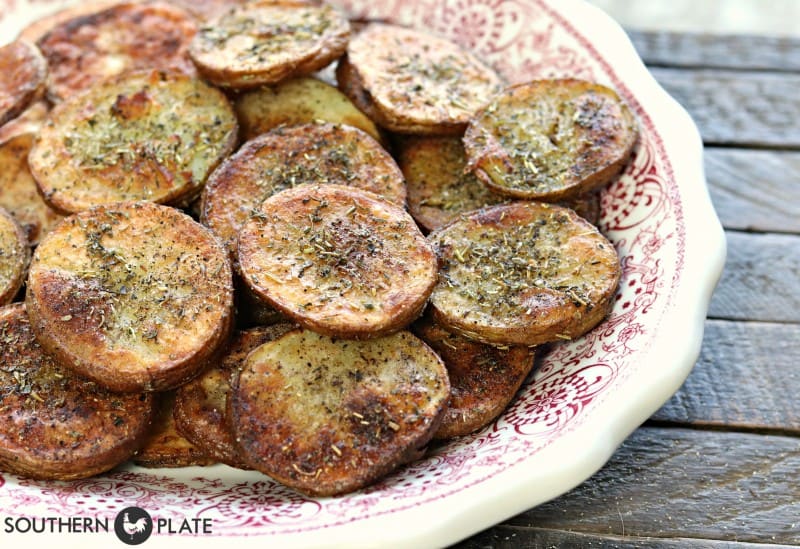 Baked potatoes in Italian seasoning.