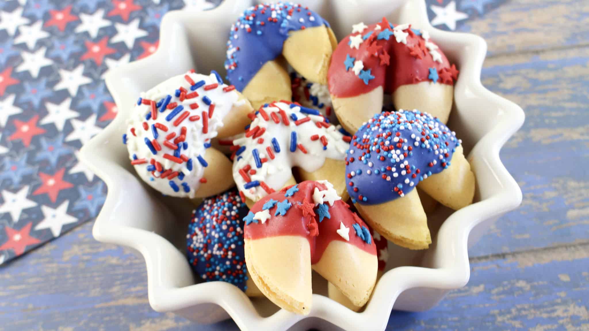 Patriotic fortune cookies in a white serving dish.
