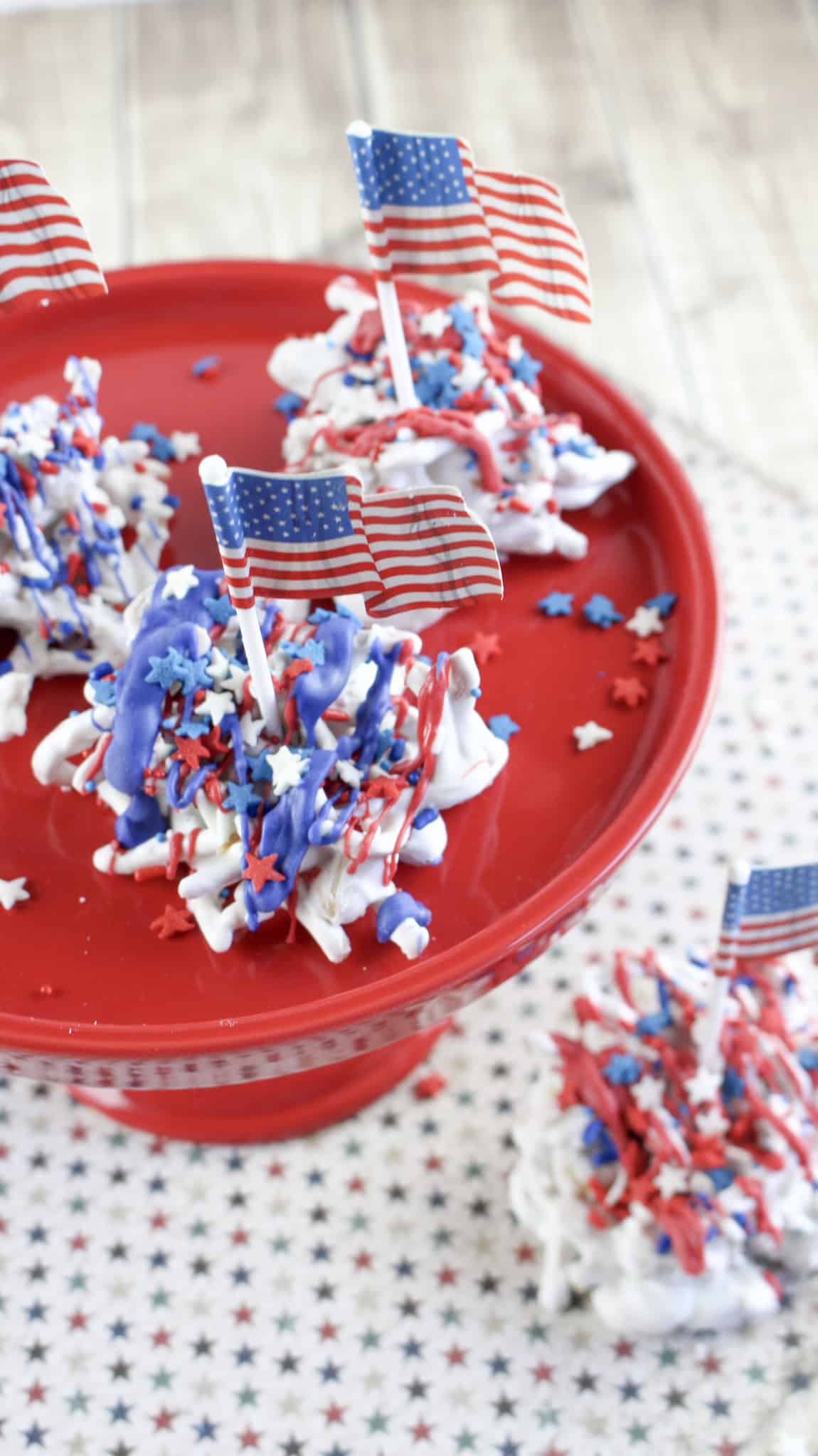 Old glory haystacks candy topped with red, white, and blue sprinkles and American flags.