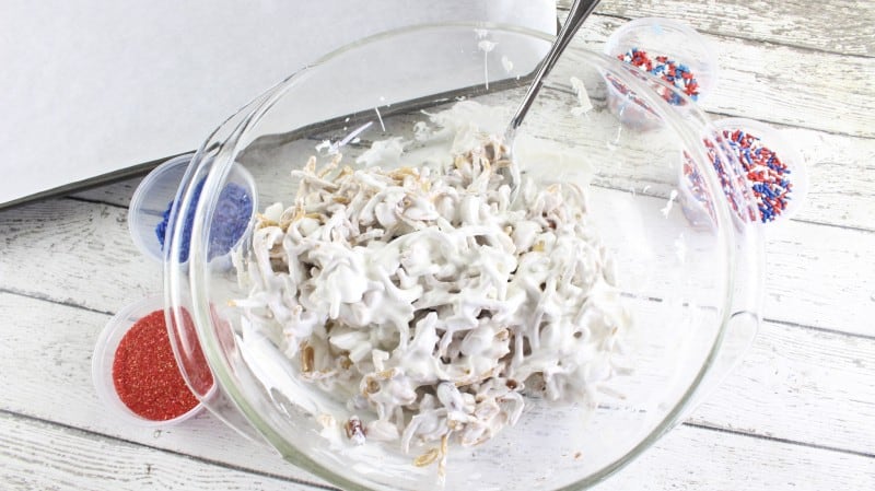 Chow mein noodles and cocktail peanuts coated in white almond bark.