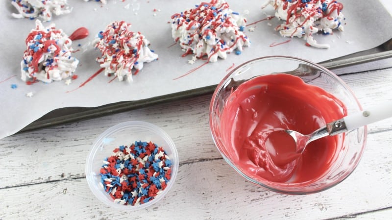 Add red and blue candy drizzle if using.