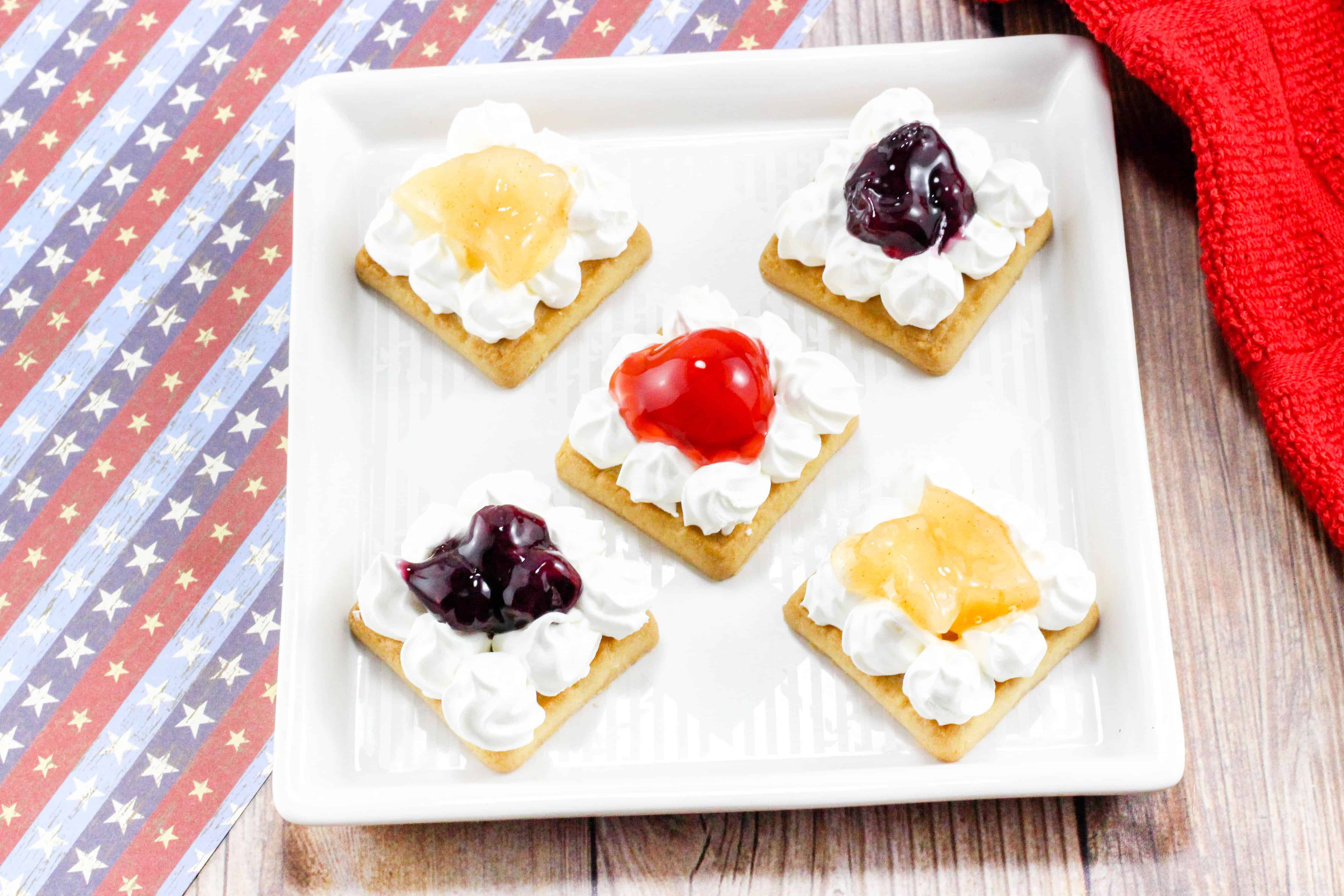 Fruit pie cookies on a white serving tray, a delicious 4th of July recipe.