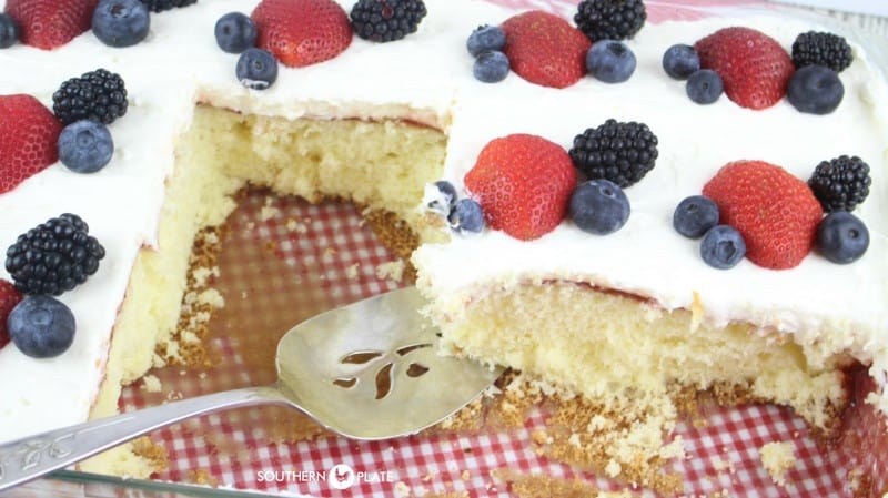 Removing slice of Chantilly Sheet Cake.