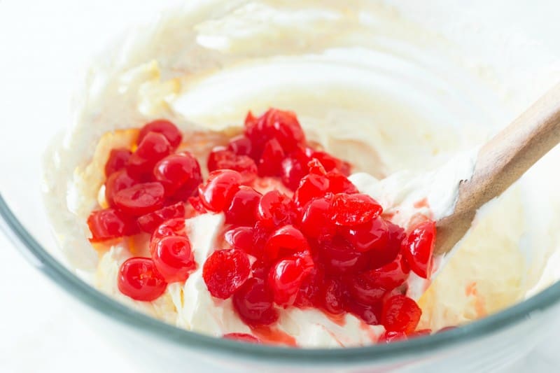 Add whipped topping and cherries to mixing bowl.