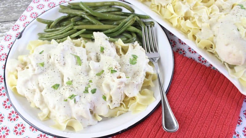 Plate of chicken with sour cream sauce.