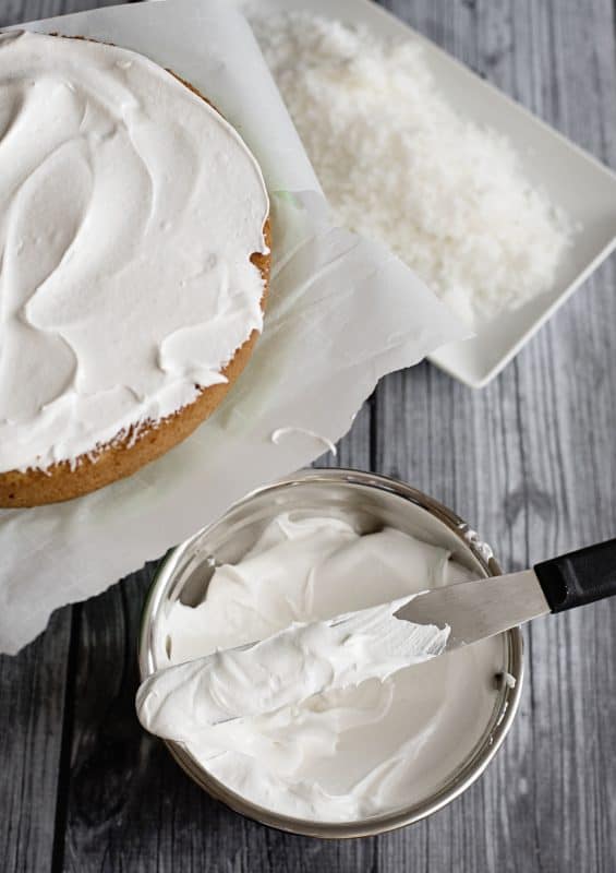 Icing Grandmama's Coconut Cake with No Fail Seven Minute Frosting