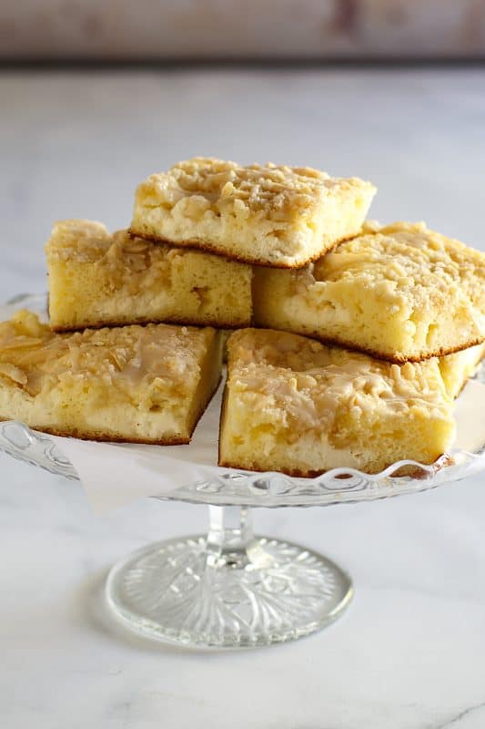 Serving dish filled with slices of cream cheese danish.