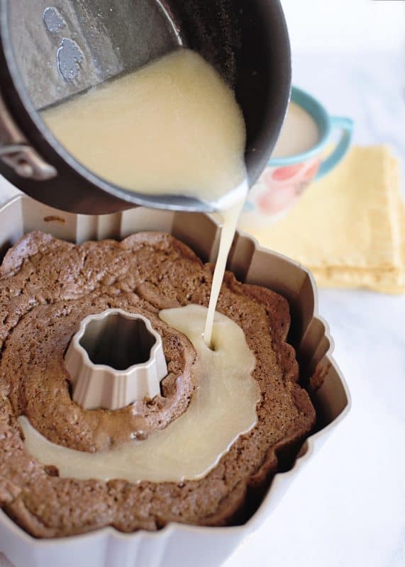 Pour coffee butter sauce over cake.
