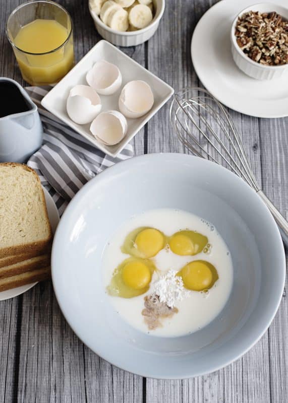 In a large bowl, mix half and half, eggs, salt, confectioner's sugar, and vanilla together.