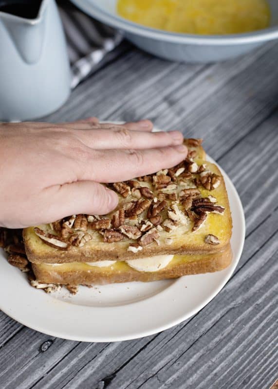 Press pecans into both sides of sandwich.