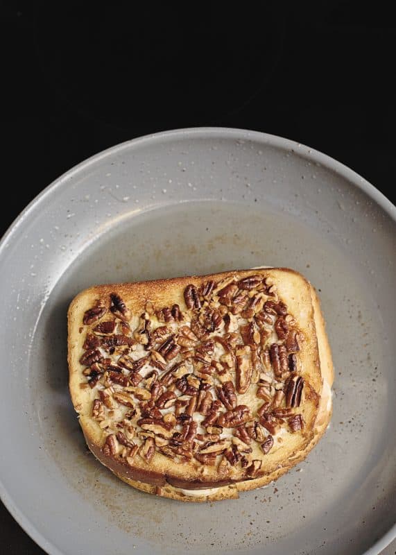 Fry banana french toast sandwich in skillet until both sides are lightly brown.