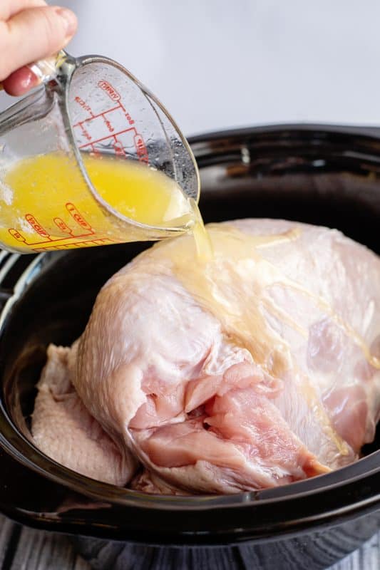 pour butter over turkey breast in crock pot