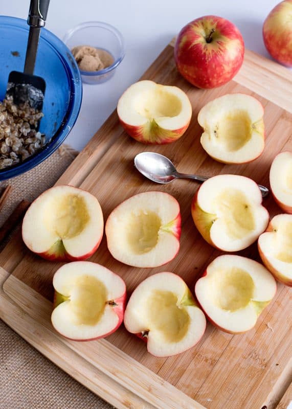 Scoop out the core of each apple.