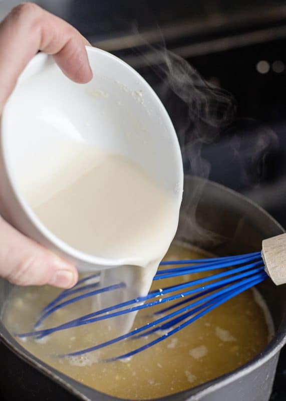 Add flour mixture to broth and mix well.