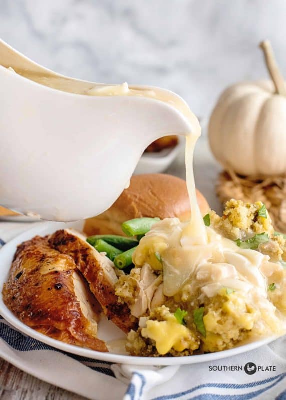 Crock pot dressing covered in gravy.