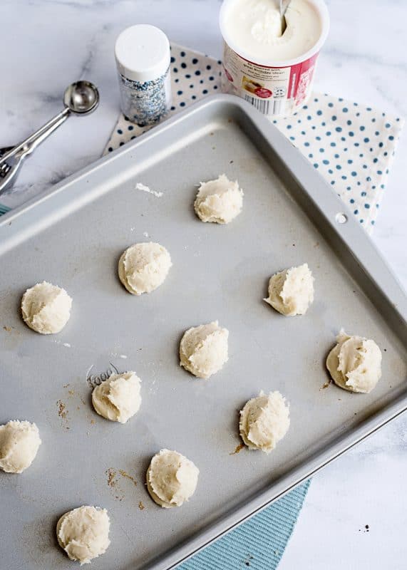 Dough balls on baking sheet.