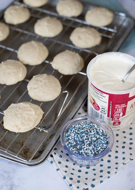 Sprinkles and frosting to go on cookies.