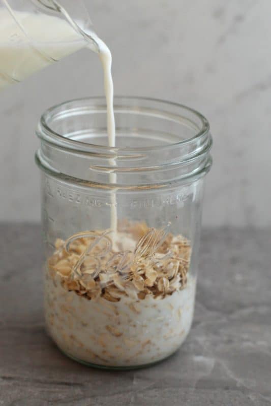 Add milk and oats to mason jar.