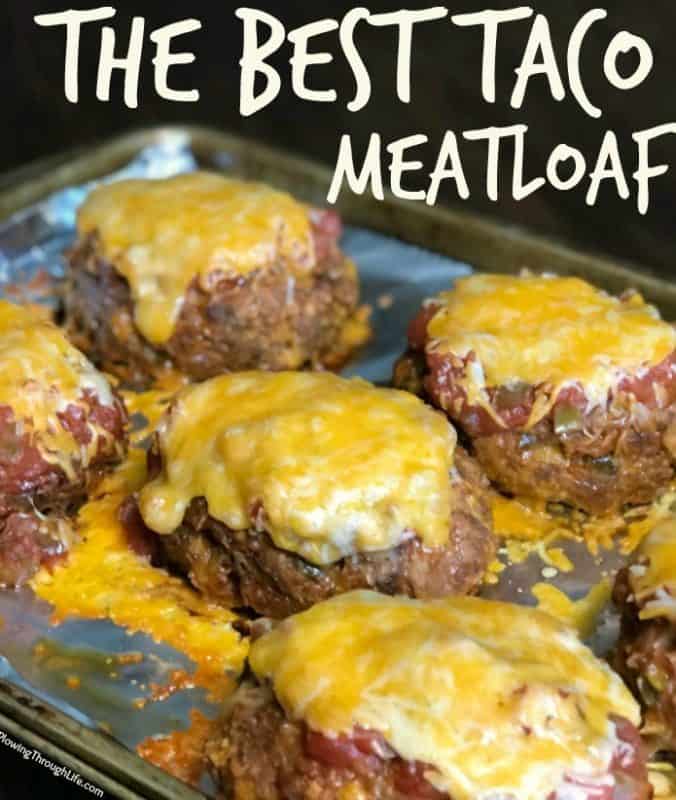 the best taco meatloaf - cheese covered patties on a baking sheet