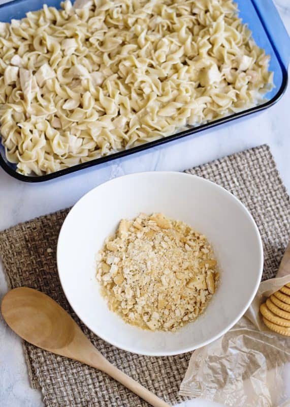 Mix together crushed crackers and melted butter to make topping.