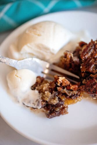 Forkful of chocolate pecan pie.